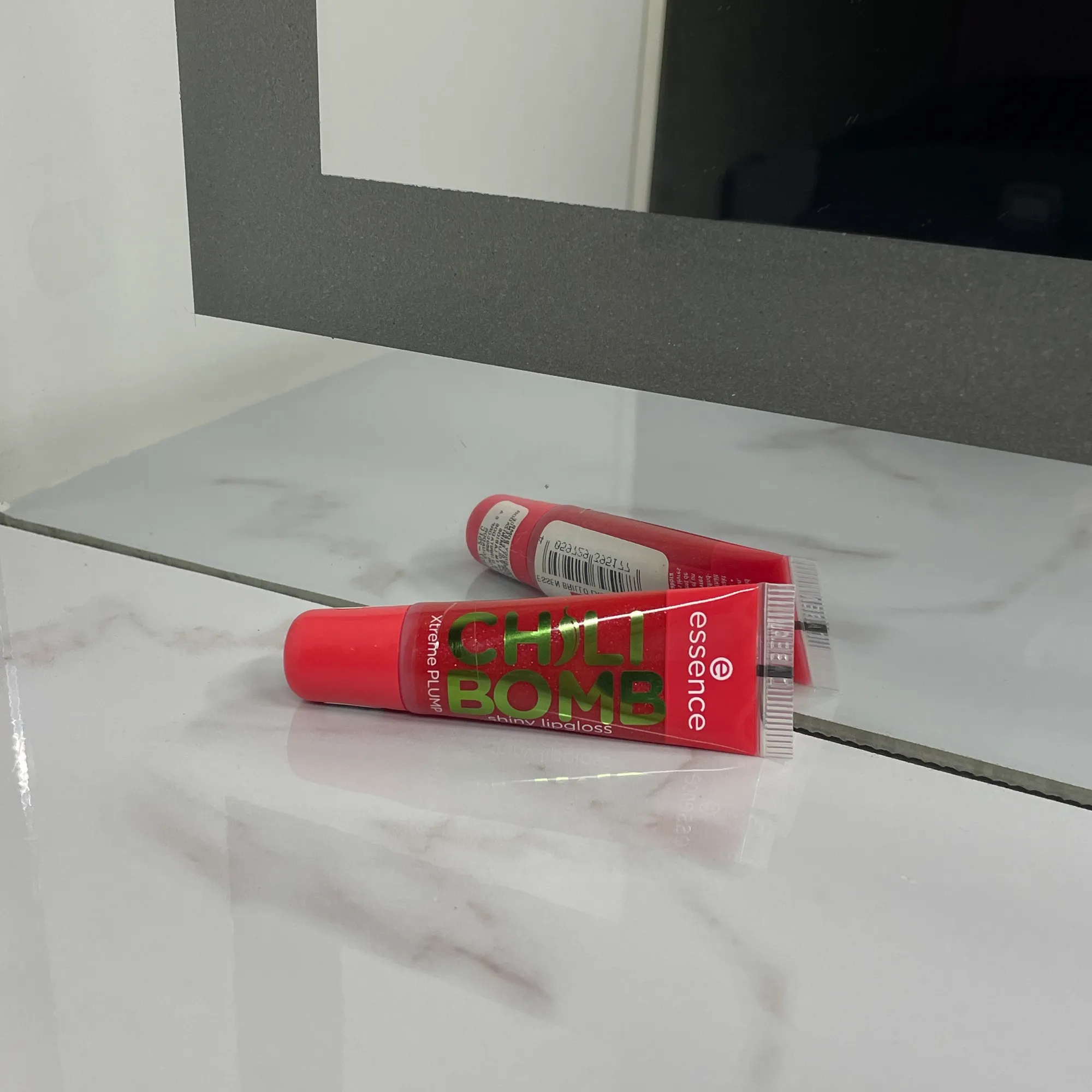 Essence Chilli Bomb Lip Gloss - Image 1