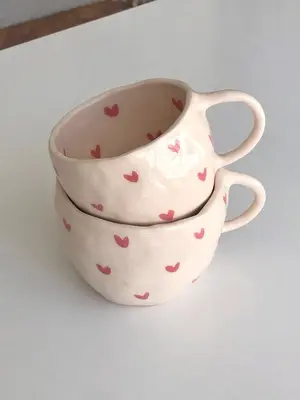Taza ceramica de flores color rosado