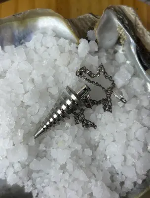 Péndulo metalico