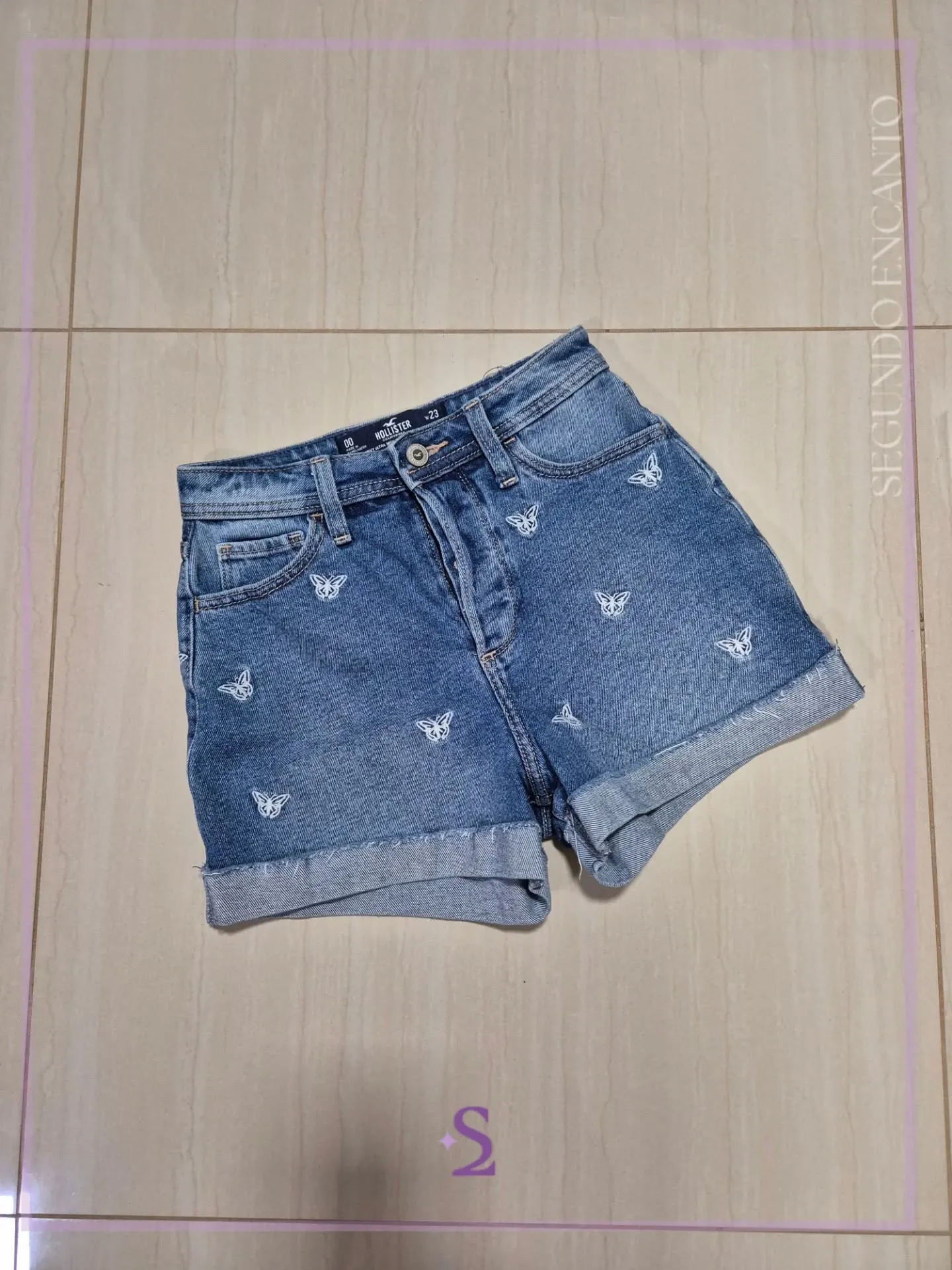 Short denim con mariposas bordadas w23 como XS - Image 1