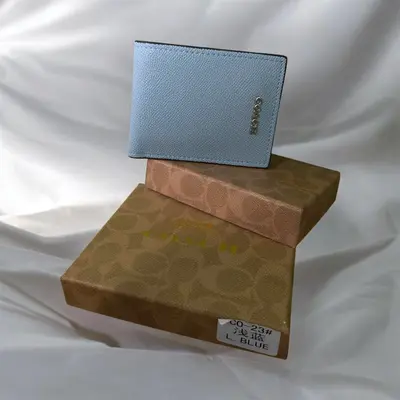 Billetera coach azul 