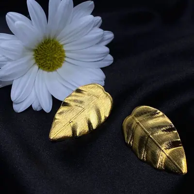 ARETES HOJAS ANCESTRALES